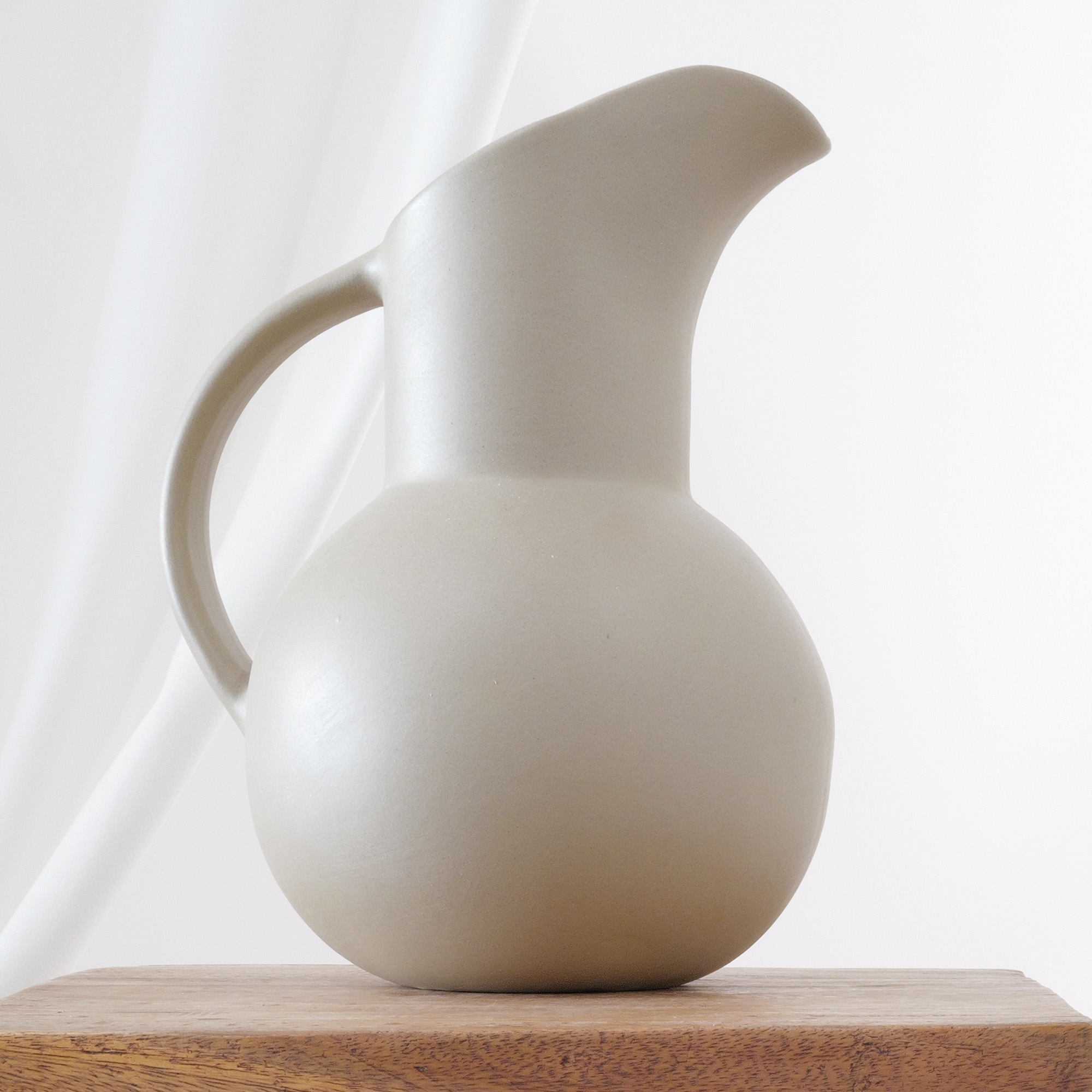Matte sculputral midcentry modern ceramic pitcher.  Made by American ceramics maker Hartstone.
